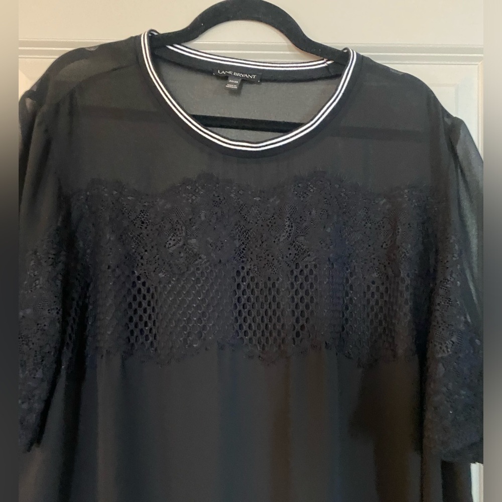 Sheer black top with white neckline